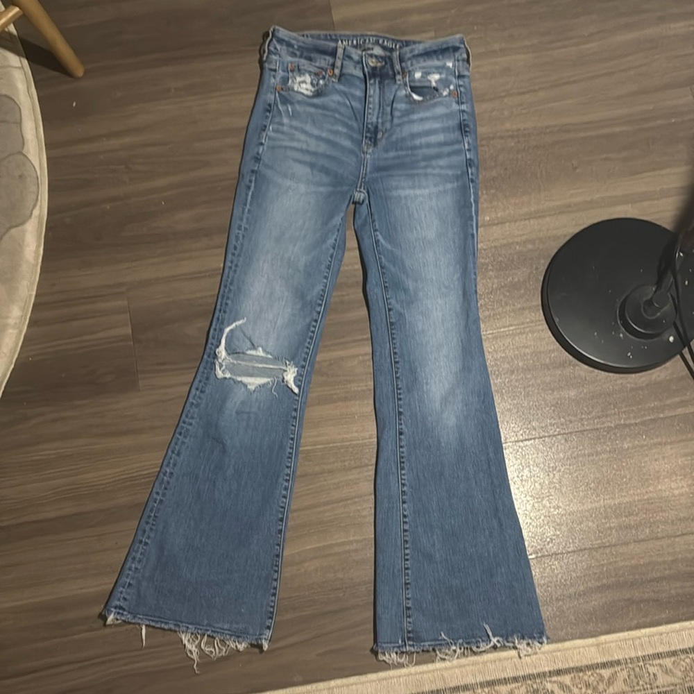 American Eagle Light Blue Denim with Copper Buttons